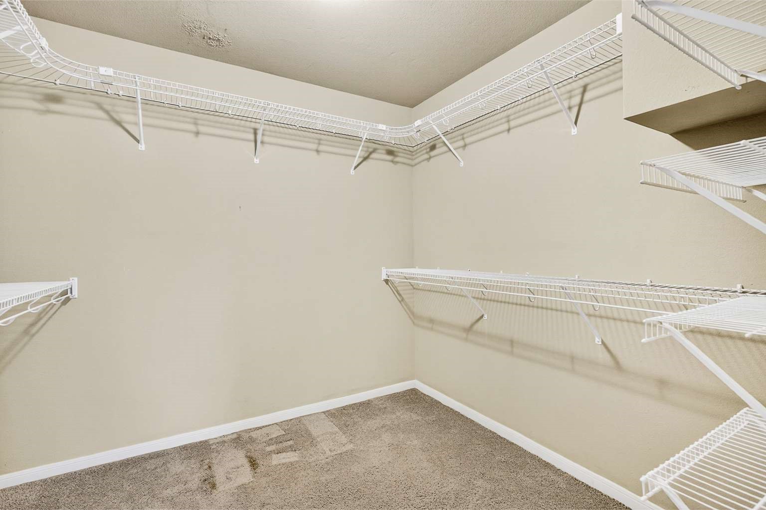 329 Gou Hole Road Cove, TX 77523 - Photo 13 of 19 a view of a room with racks on the wall