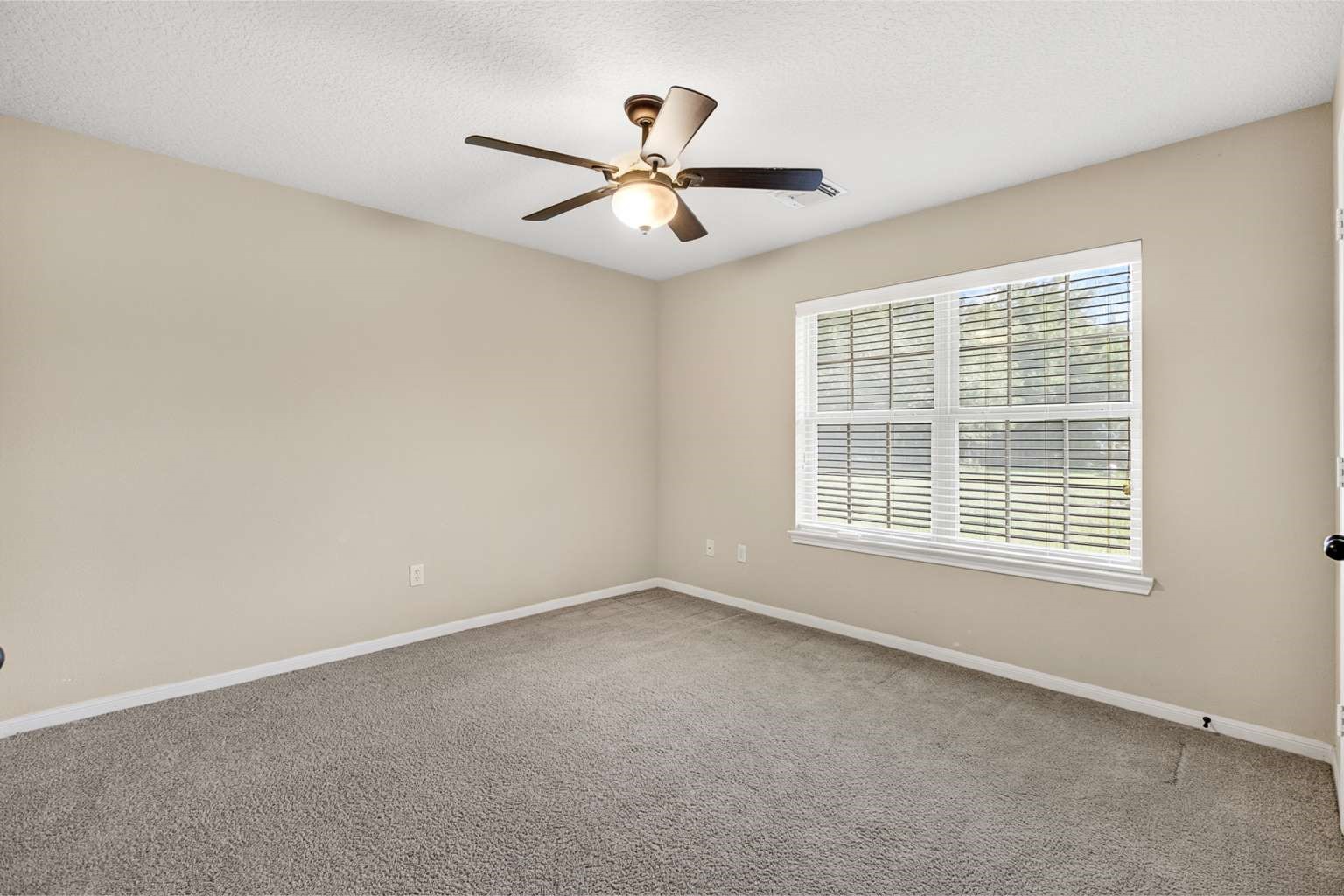 329 Gou Hole Road Cove, TX 77523 - Photo 16 of 19 a view of an empty room with a window