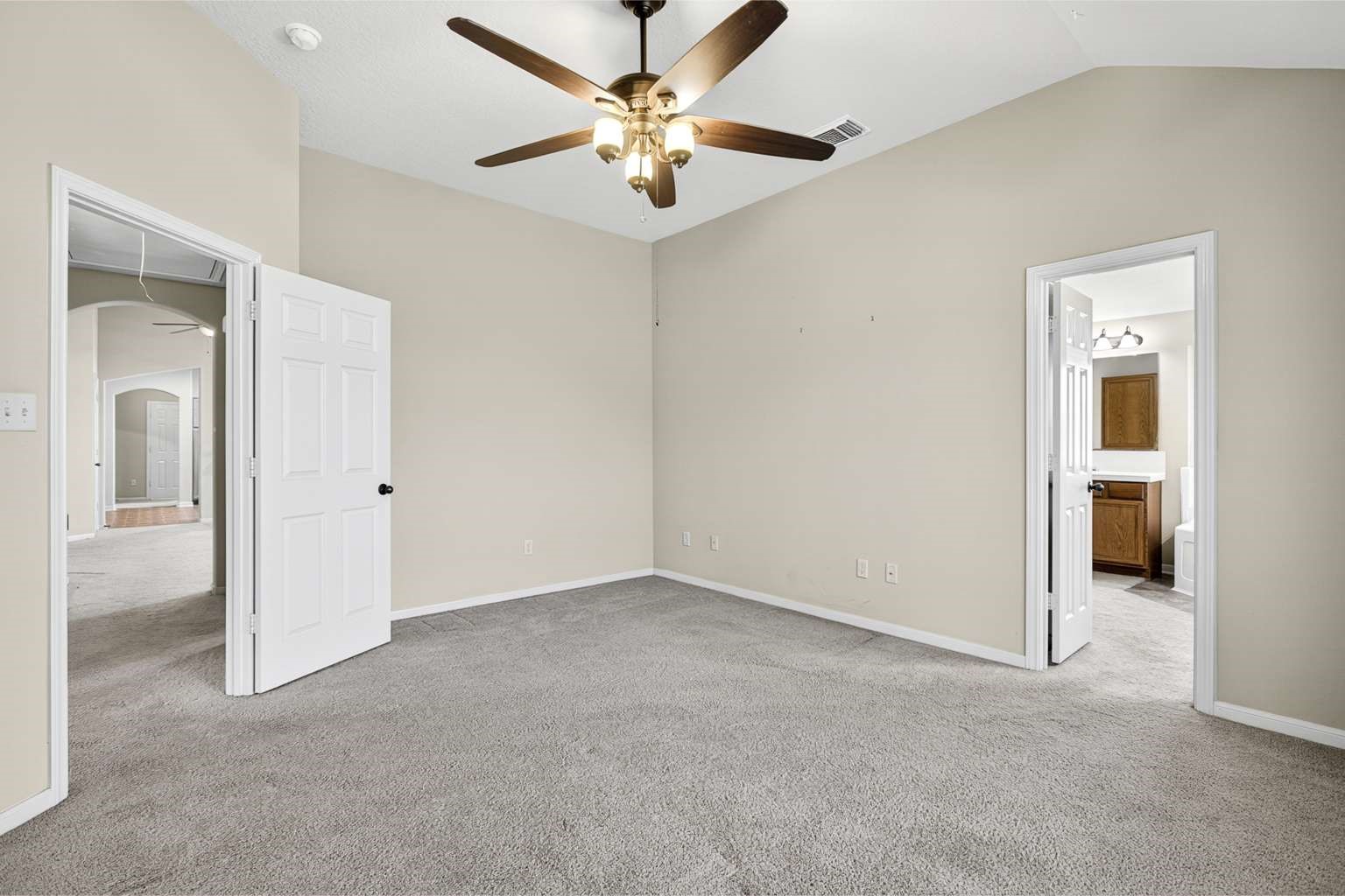 329 Gou Hole Road Cove, TX 77523 - Photo 5 of 19 an empty room with a ceiling fan and a window