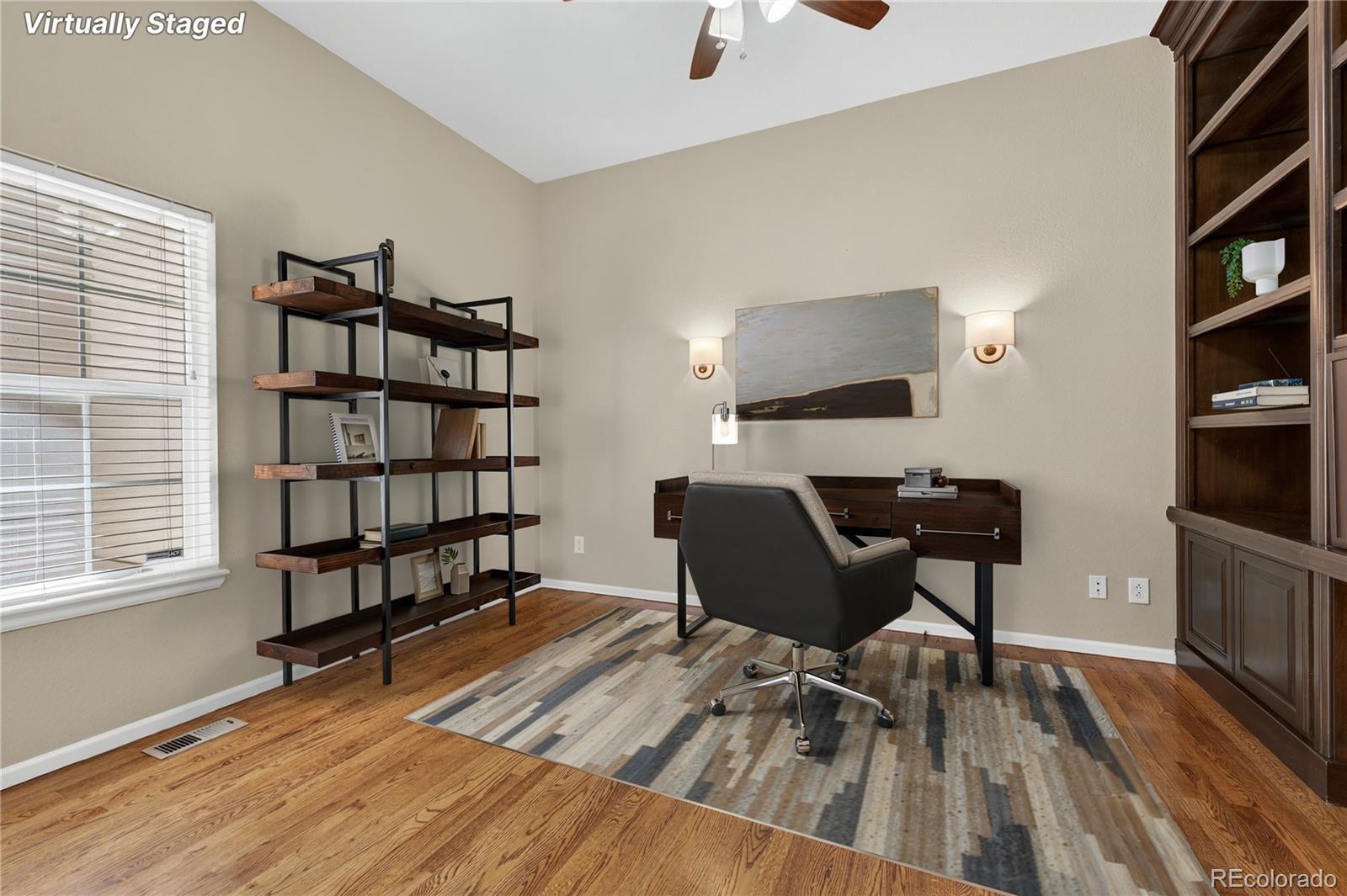10155 Joseph Drive Highlands Ranch, CO 80124 - Photo 12 of 50 a view of a workspace with furniture and a window