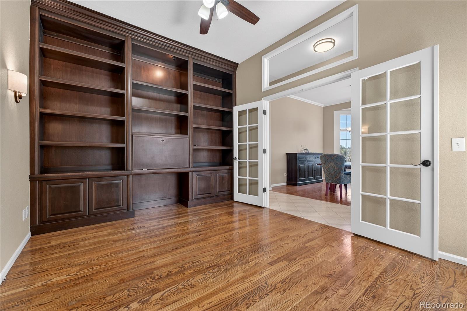 10155 Joseph Drive Highlands Ranch, CO 80124 - Photo 13 of 50 a view of an empty room with kitchen and window