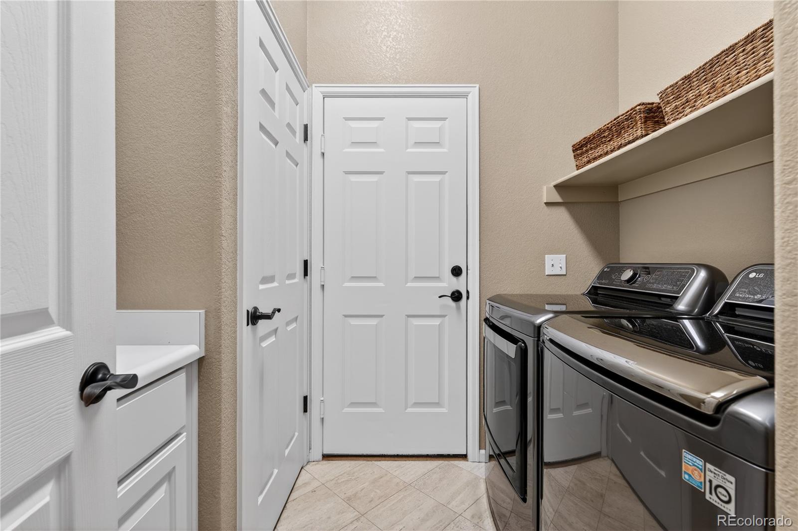 10155 Joseph Drive Highlands Ranch, CO 80124 - Photo 26 of 50 a view of a storage and utility room