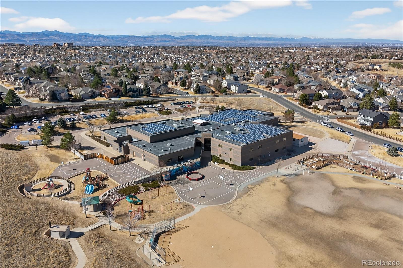 10155 Joseph Drive Highlands Ranch, CO 80124 - Photo 48 of 50 an aerial view of a house with a ocean view