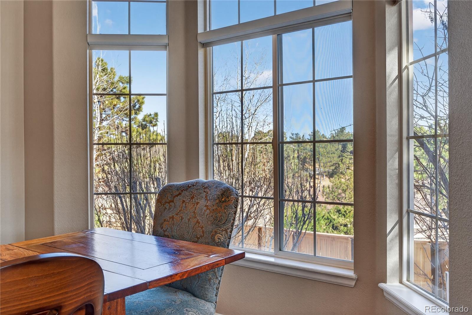 10155 Joseph Drive Highlands Ranch, CO 80124 - Photo 8 of 50 a workspace with wooden floor and a window