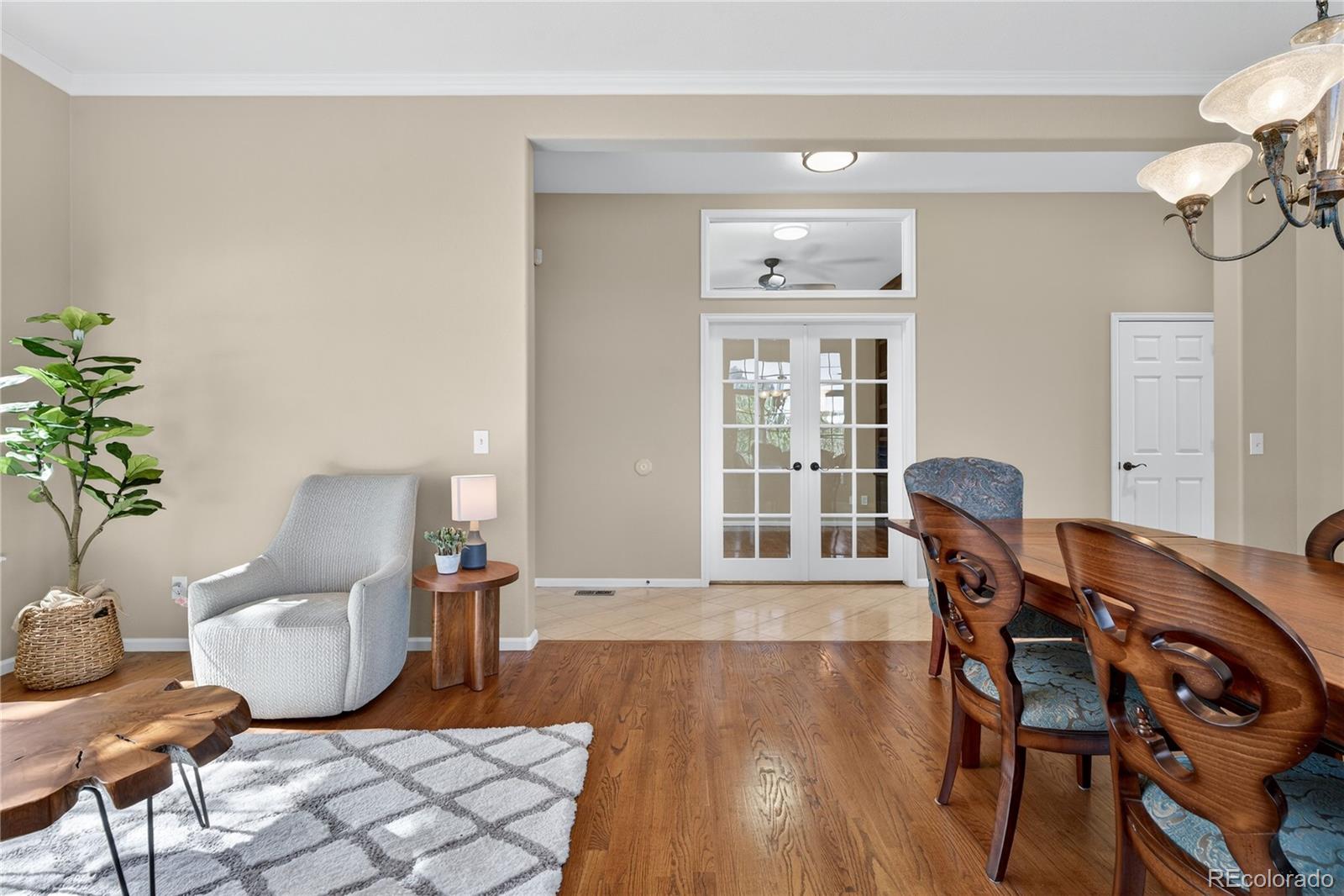 10155 Joseph Drive Highlands Ranch, CO 80124 - Photo 9 of 50 a living room with furniture and wooden floor