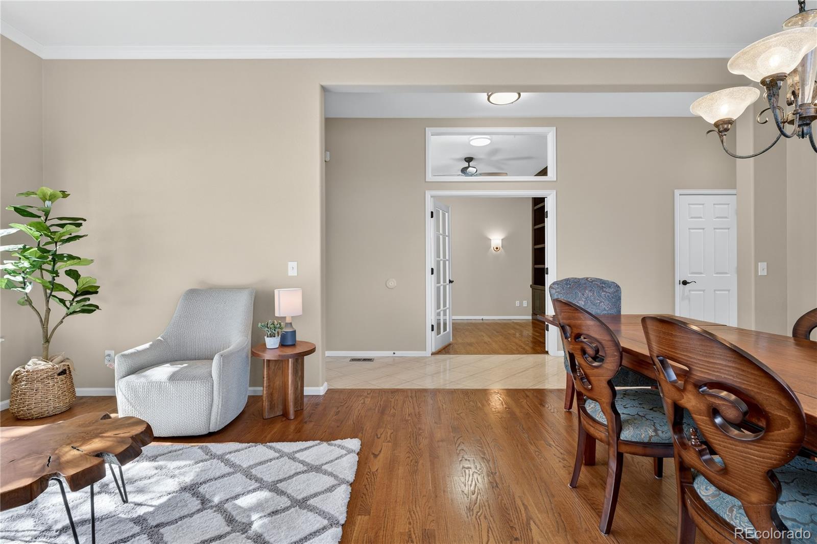 10155 Joseph Drive Highlands Ranch, CO 80124 - Photo 10 of 50 a living room with furniture and wooden floor