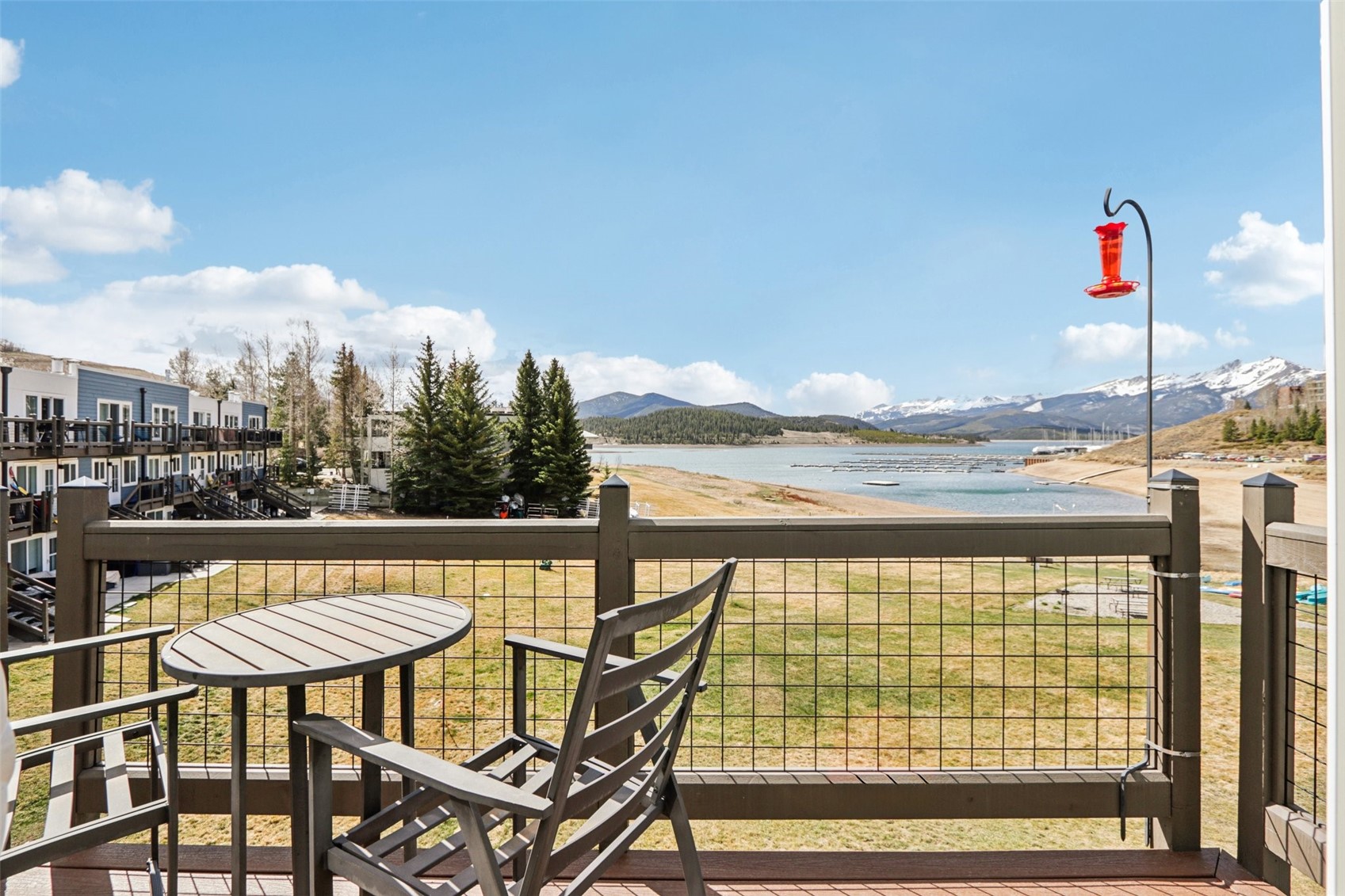 144 Gold Run Circle, Unit 17 Dillon, CO 80435 - Photo 11 of 38 a view of a chairs and table on the balcony