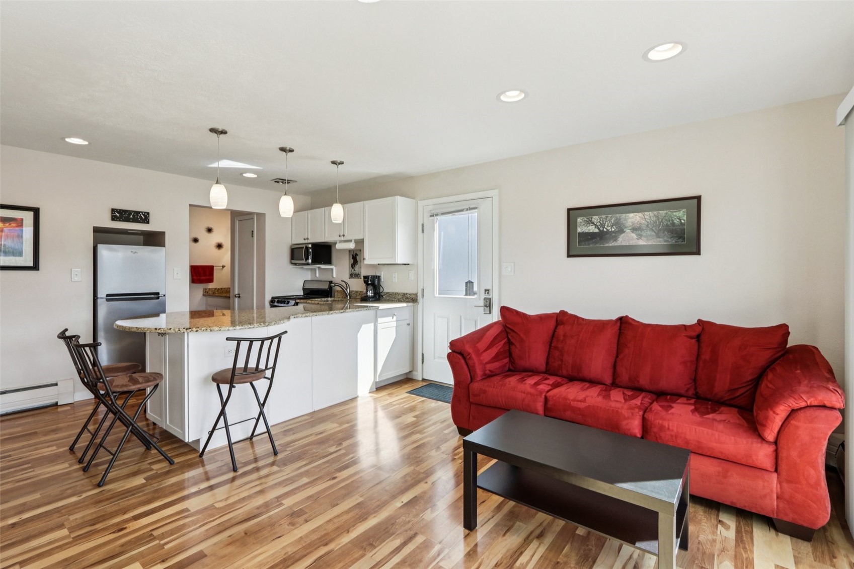 144 Gold Run Circle, Unit 17 Dillon, CO 80435 - Photo 2 of 38 a living room with furniture and kitchen view