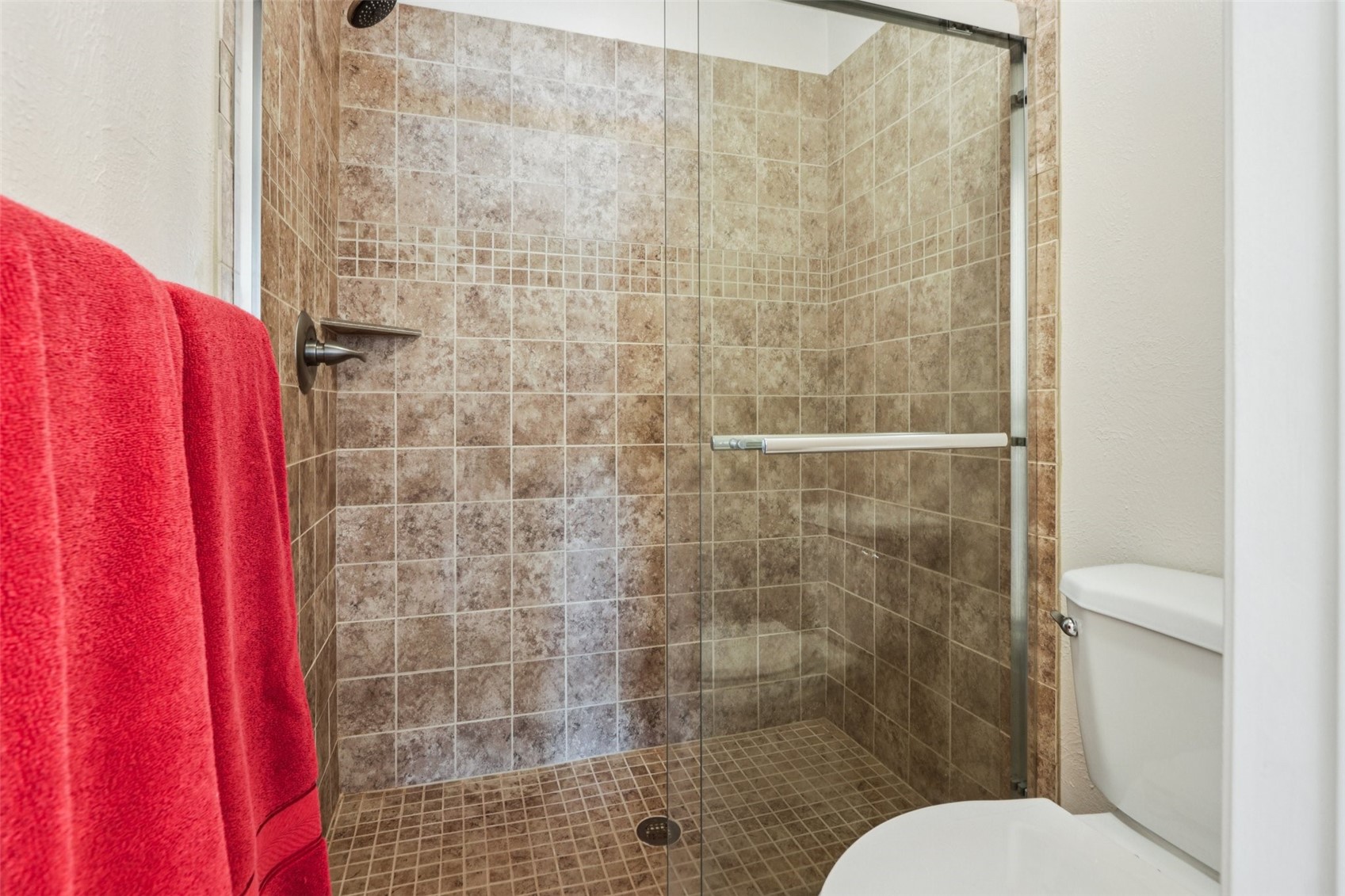 144 Gold Run Circle, Unit 17 Dillon, CO 80435 - Photo 8 of 38 a bathroom with a toilet and shower