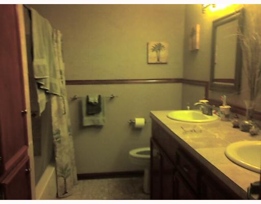 3325 South Staples Street Corpus Christi, TX 78411 - Photo 8 of 10 a bathroom with a sink and mirror