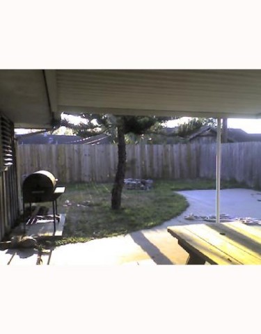 3325 South Staples Street Corpus Christi, TX 78411 - Photo 9 of 10 a view of swimming pool in back yard of the house