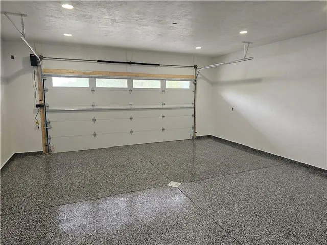 a view of balcony with wooden floor