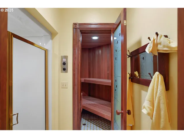 a view of a bathroom from a hallway