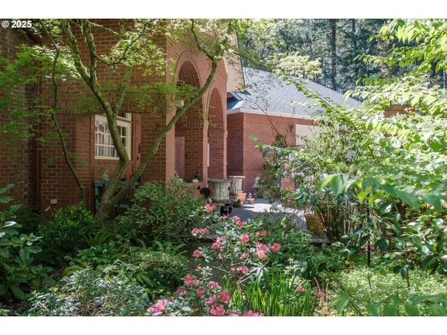 a view of a house with a garden