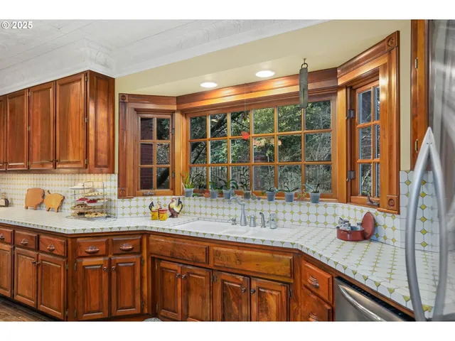 a kitchen with a sink and a window