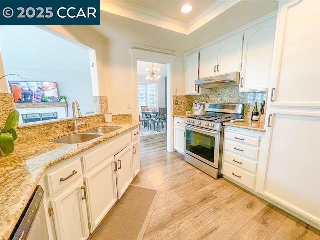 232 O'Neil Circle Hercules, CA 94547 - Photo 6 of 12 a kitchen with stainless steel appliances granite countertop a stove and a sink