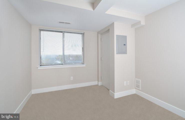 515 West Chelten Avenue, Unit 2B1302 Philadelphia, PA 19144 - Photo 19 of 36 a view of an empty room with a window
