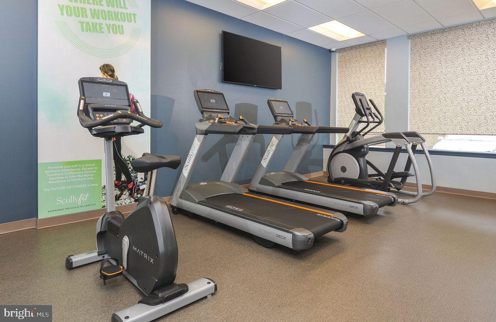 515 West Chelten Avenue, Unit 2B1302 Philadelphia, PA 19144 - Photo 32 of 36 a view of a room with gym equipment