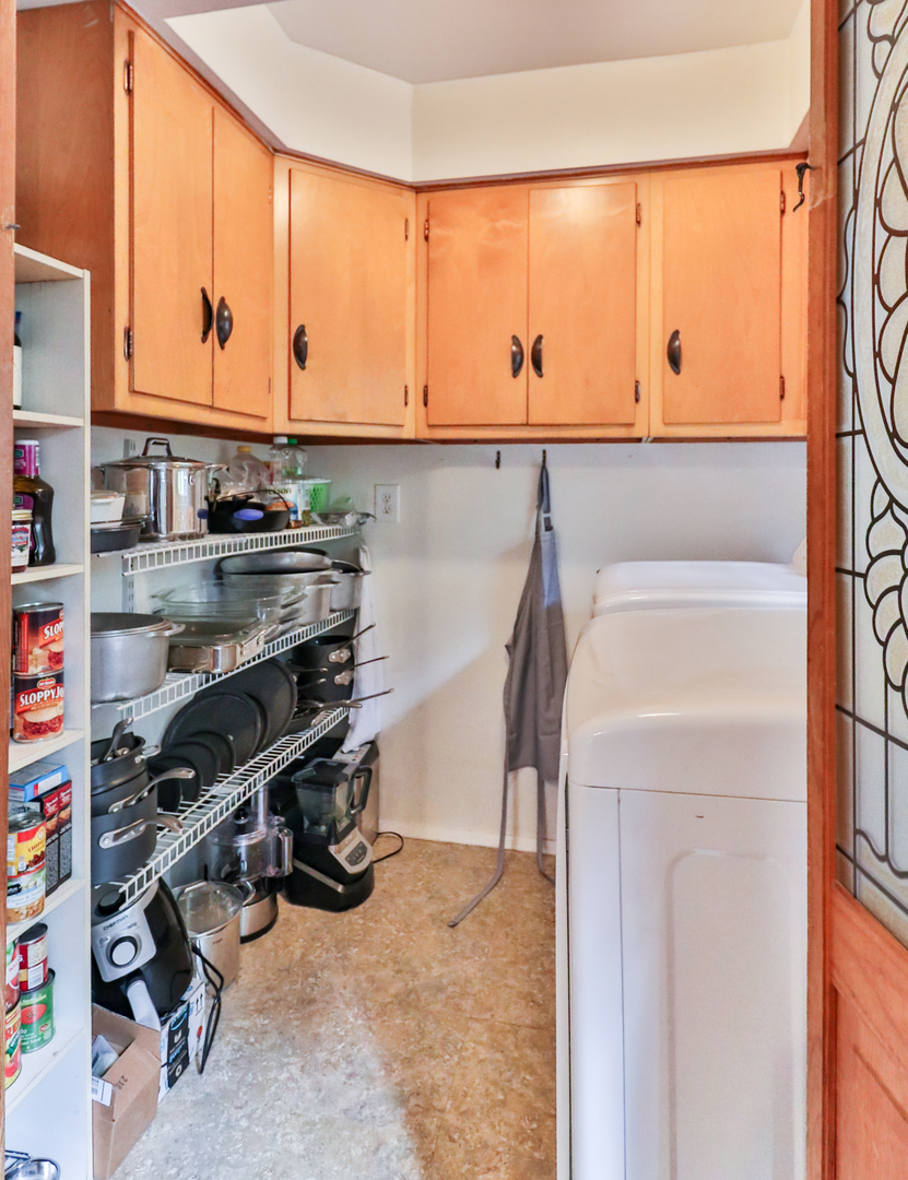 15 Rugby Place Elgin, IL 60120 - Photo 15 of 24 a view of storage and utility room with washer and dryer