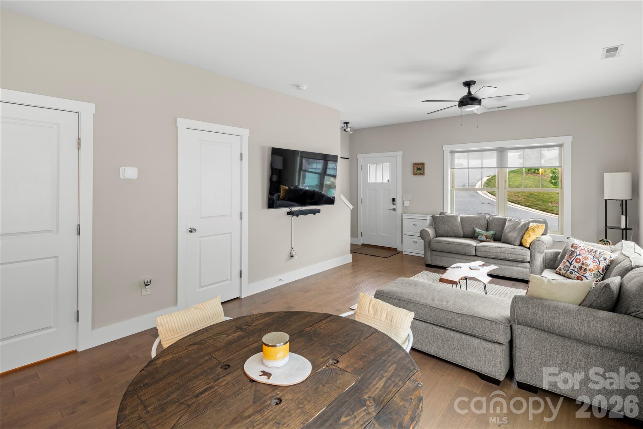 52 Wheeler Road Weaverville, NC 28787 - Photo 8 of 21 a living room with furniture and a flat screen tv