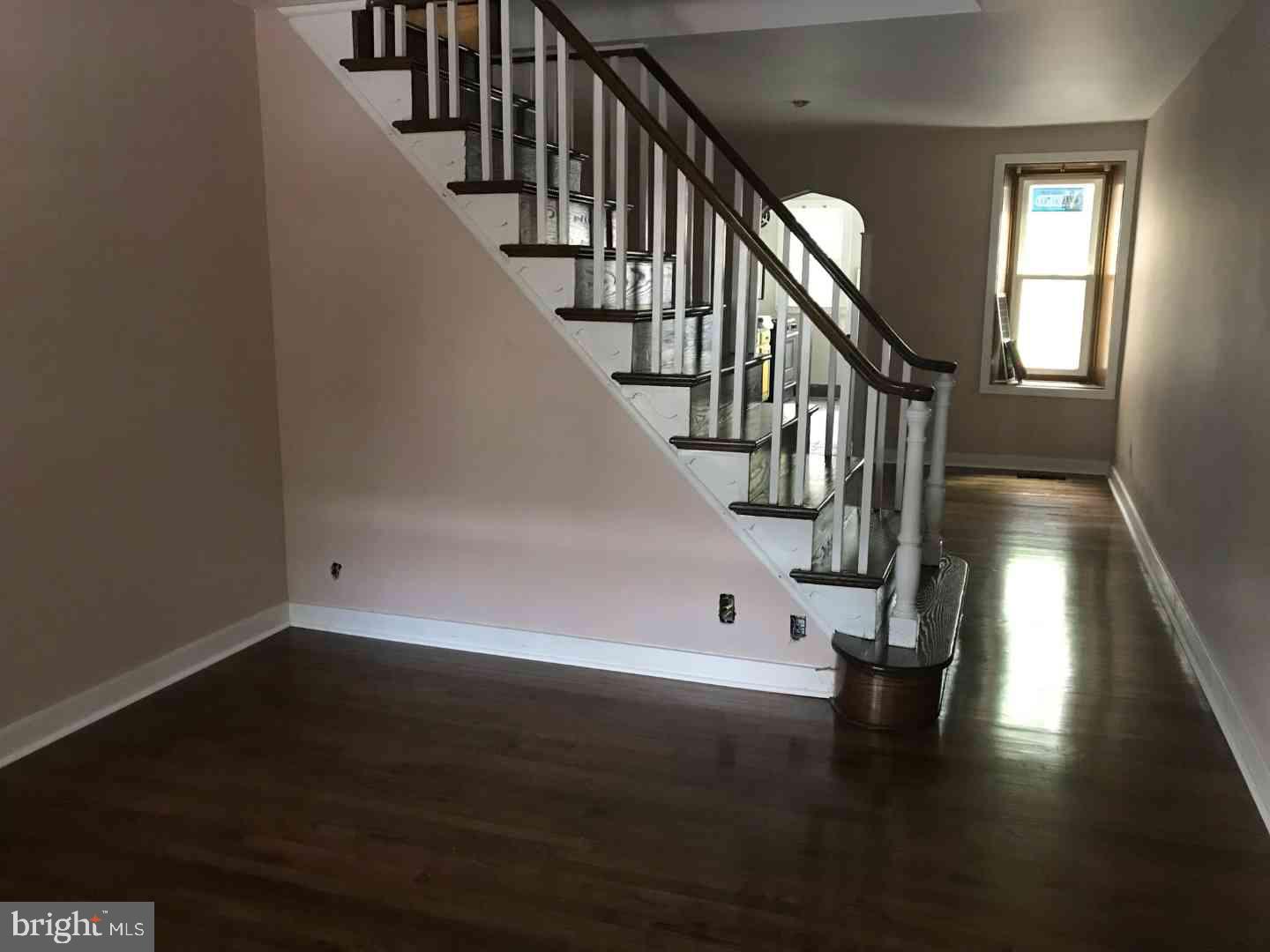 443 Ripka Street Philadelphia, PA 19128 - Photo 1 of 5 Inviting space with elegant staircase.