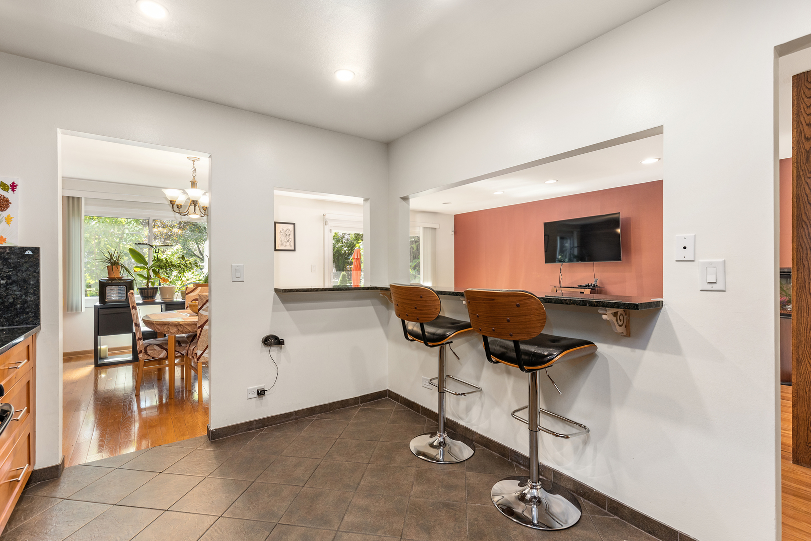 833 Swallow Street Deerfield, IL 60015 - Photo 12 of 37 a workspace with furniture and a flat screen tv