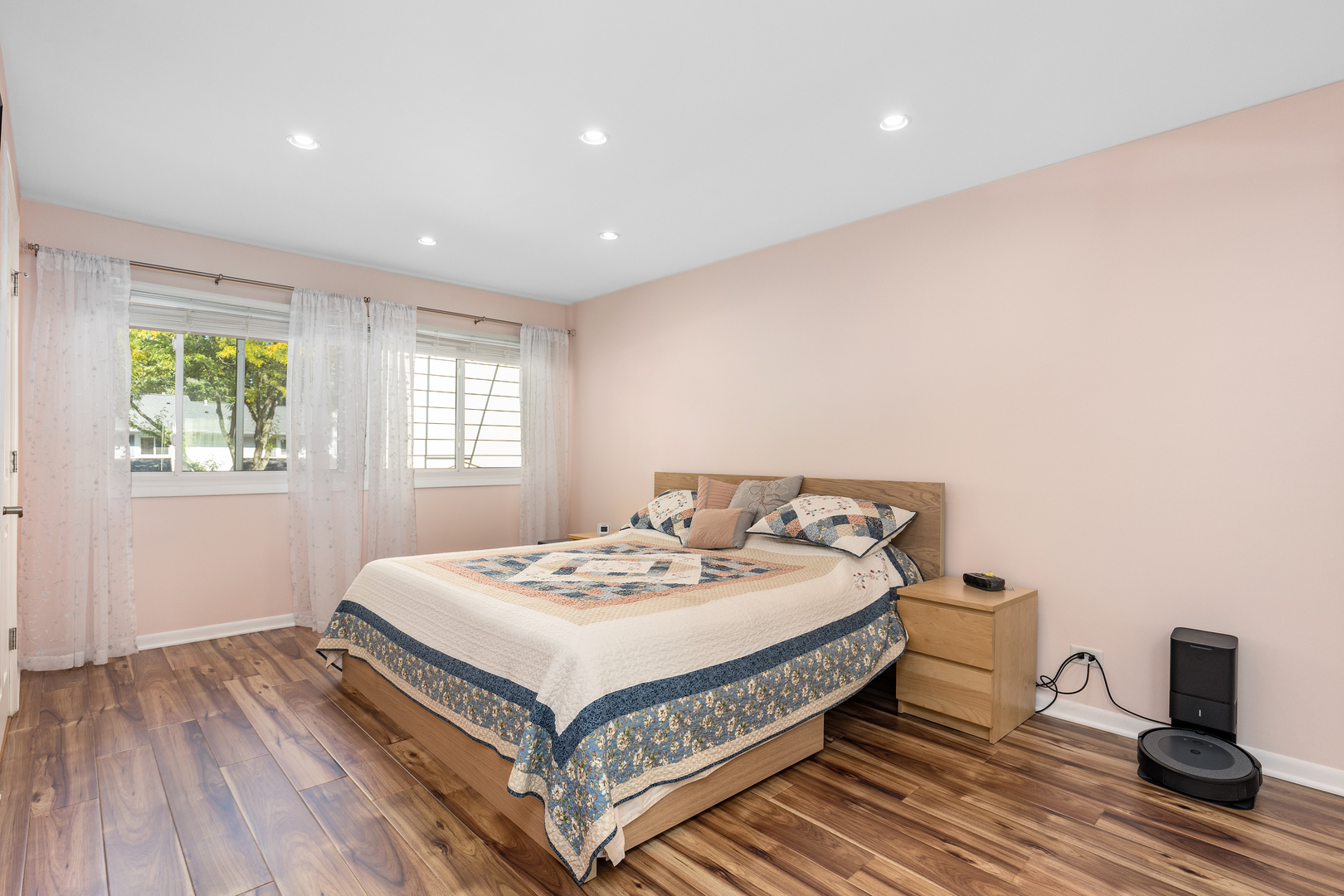 833 Swallow Street Deerfield, IL 60015 - Photo 14 of 37 a bed sitting in a spacious bedroom next to a window