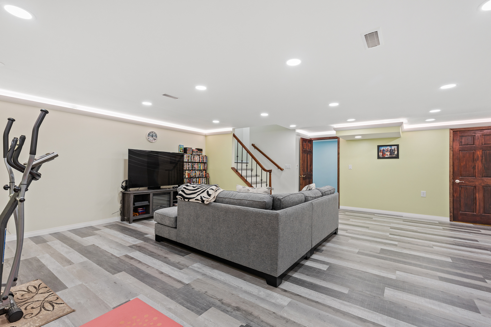 833 Swallow Street Deerfield, IL 60015 - Photo 23 of 37 a living room with furniture and a flat screen tv