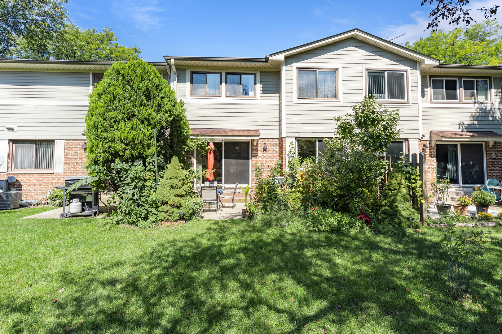 833 Swallow Street Deerfield, IL 60015 - Photo 26 of 37 a house that is sitting in the grass