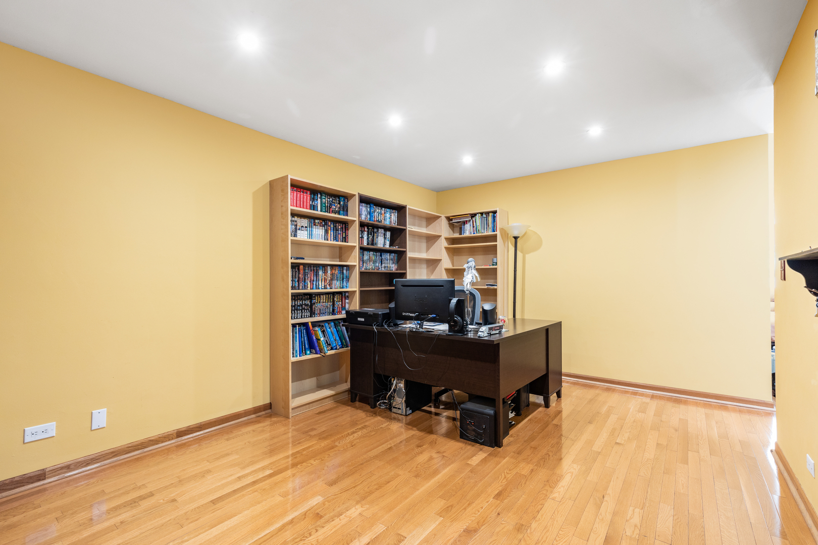 833 Swallow Street Deerfield, IL 60015 - Photo 4 of 37 a view of a workspace with furniture and wooden floor