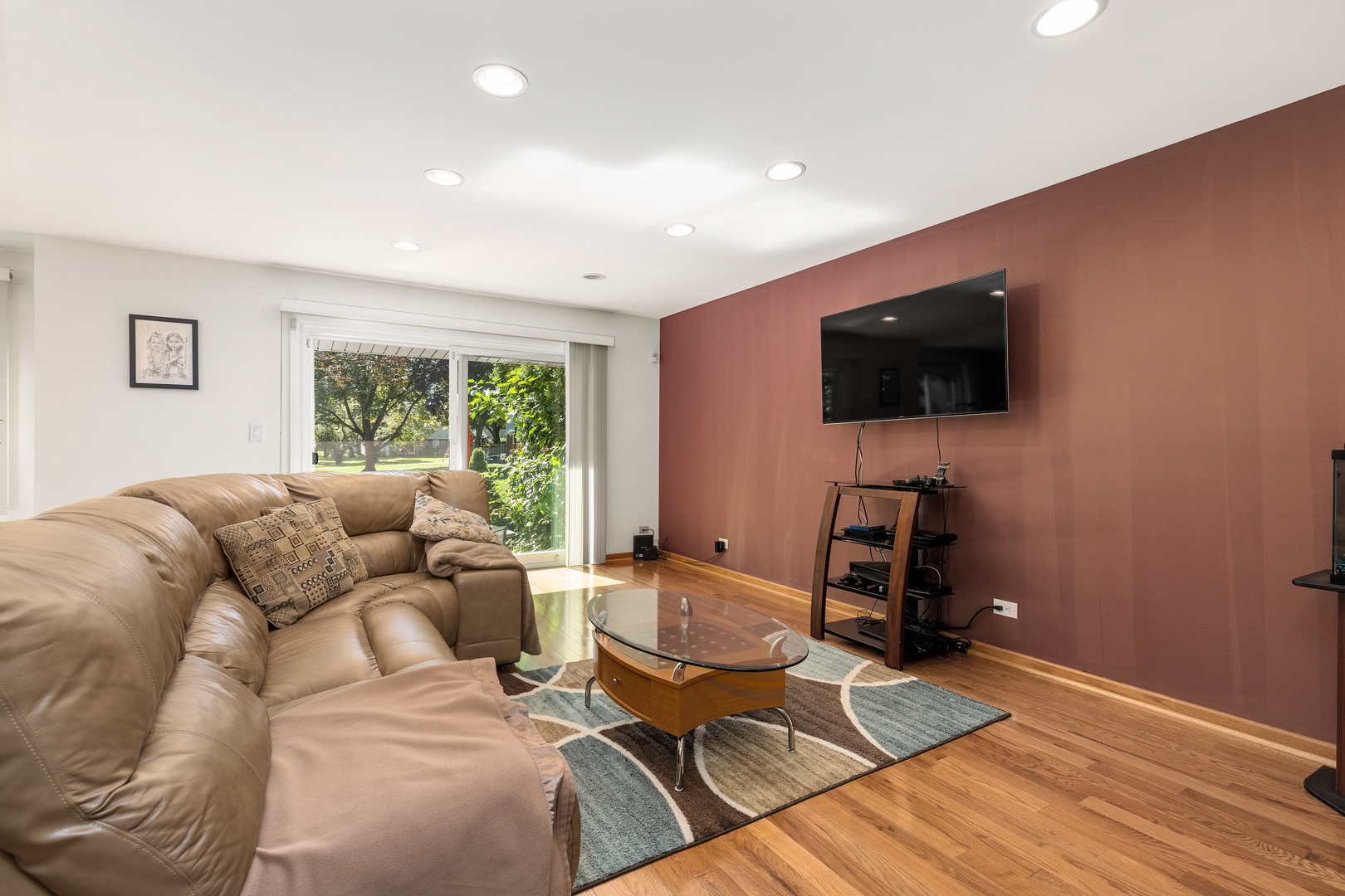 833 Swallow Street Deerfield, IL 60015 - Photo 6 of 37 a living room with furniture and a flat screen tv