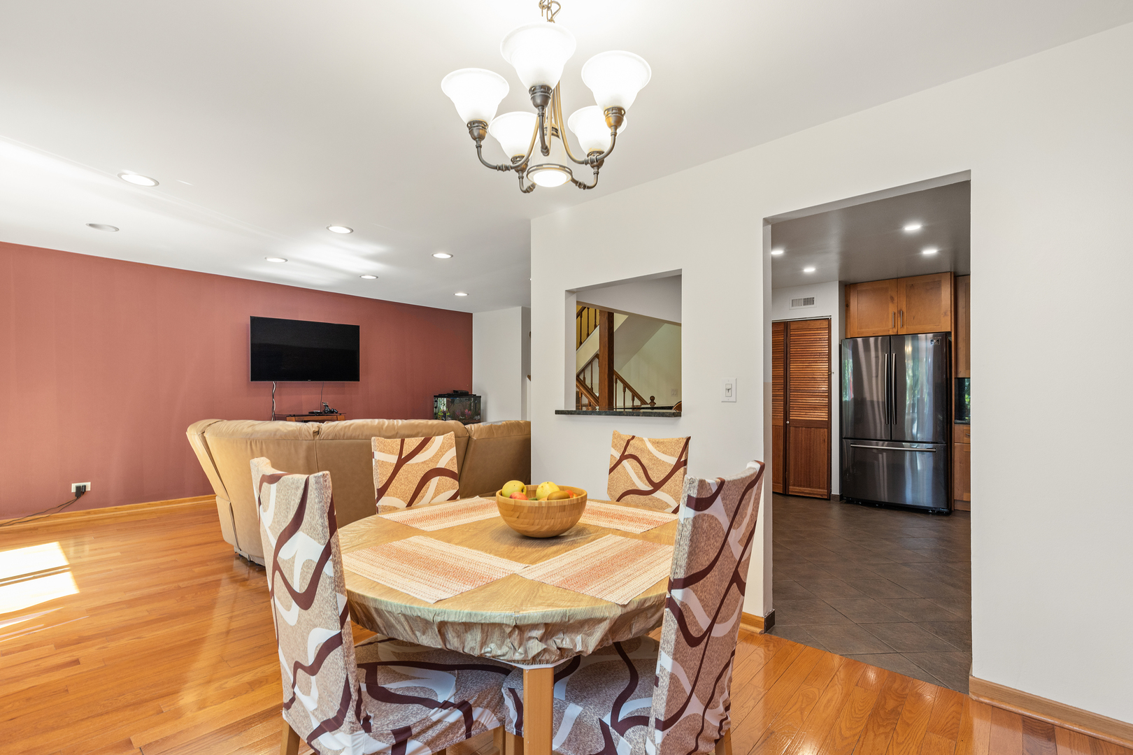 833 Swallow Street Deerfield, IL 60015 - Photo 9 of 37 a living room with furniture and a flat screen tv