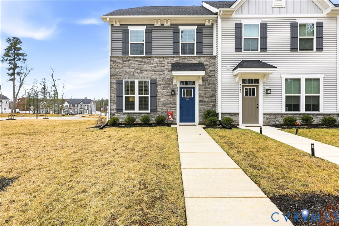 2031 Turtle Parkway Sandston, VA 23150 - Photo 1 of 26 a front view of a house with a yard