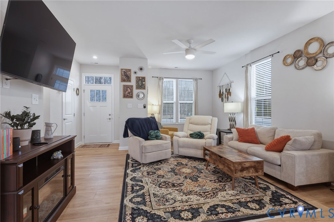 2031 Turtle Parkway Sandston, VA 23150 - Photo 12 of 26 a living room with furniture and a flat screen tv