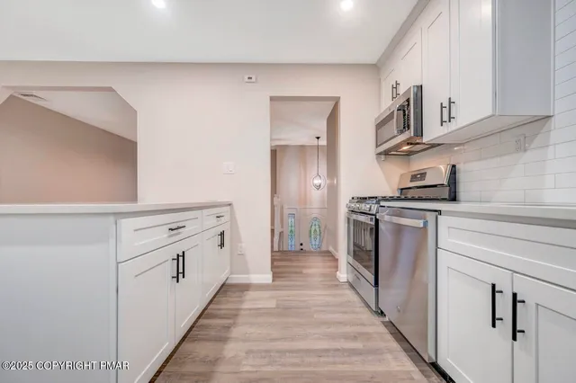 a view of a hallway with closet