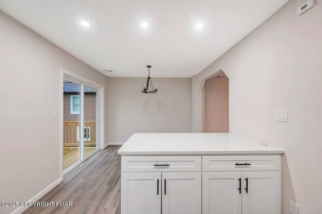 a bathroom with a toilet and a sink