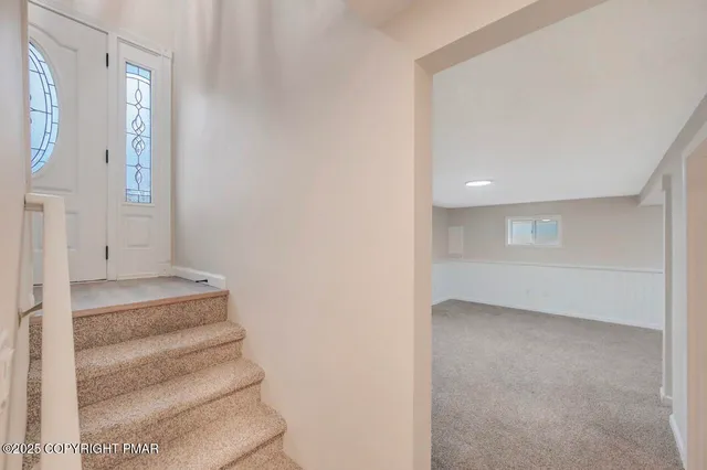 a view of a hallway with entryway