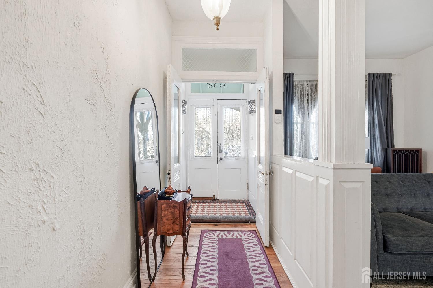 346 East Union Street Burlington, NJ 08016 - Photo 7 of 48 a view of a hallway with a living room