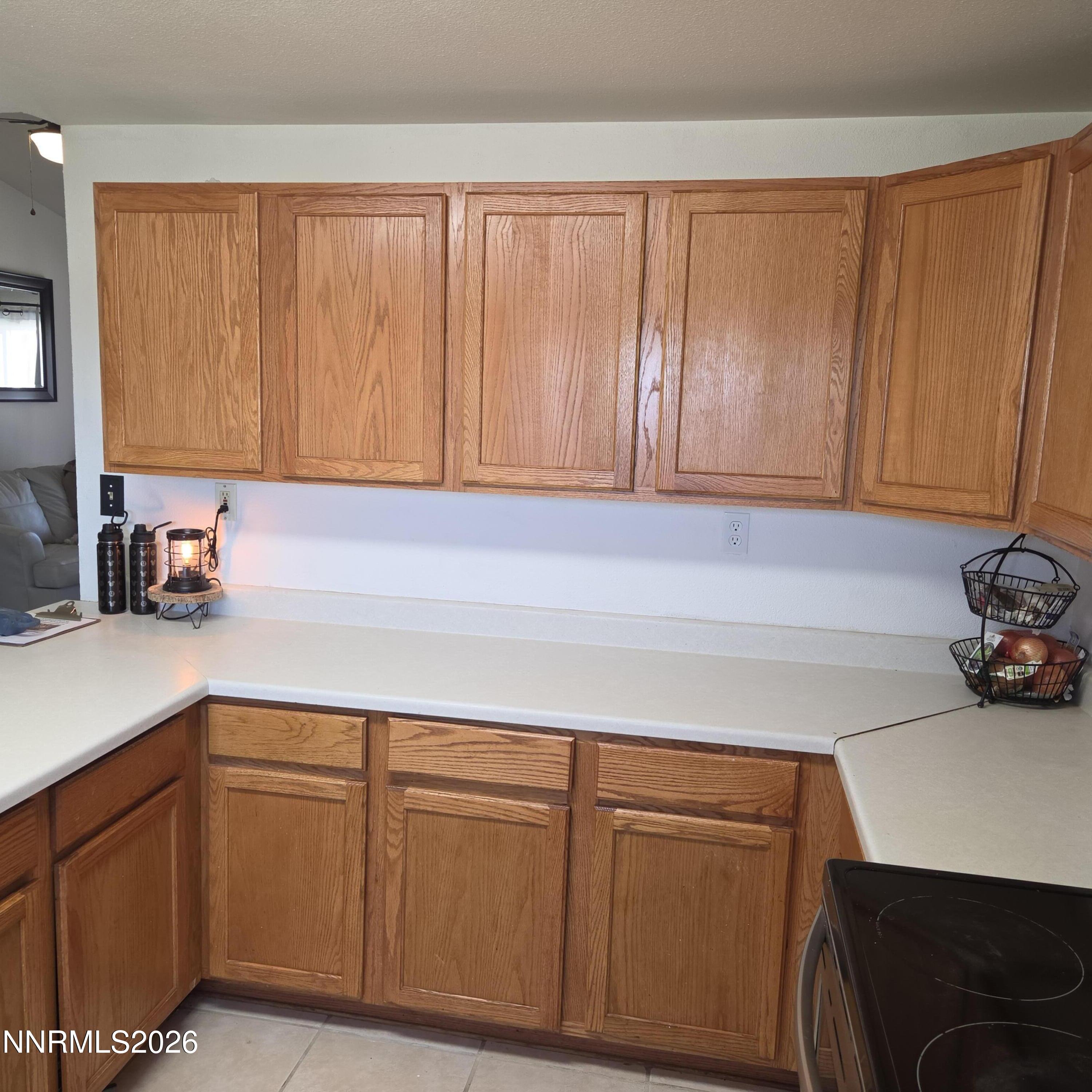1080 Tarzyn Road Fallon, NV 89406 - Photo 28 of 41 a kitchen with a sink cabinets and a window