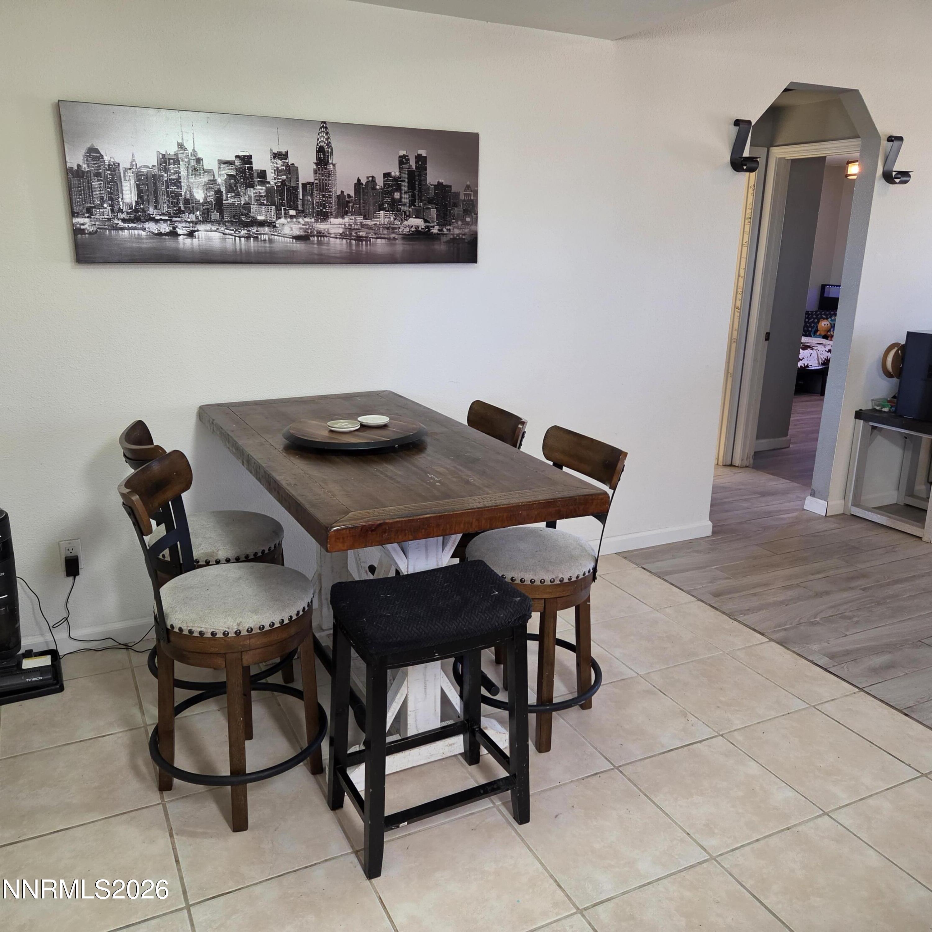 1080 Tarzyn Road Fallon, NV 89406 - Photo 29 of 41 a view of a dining room with furniture and wooden floor