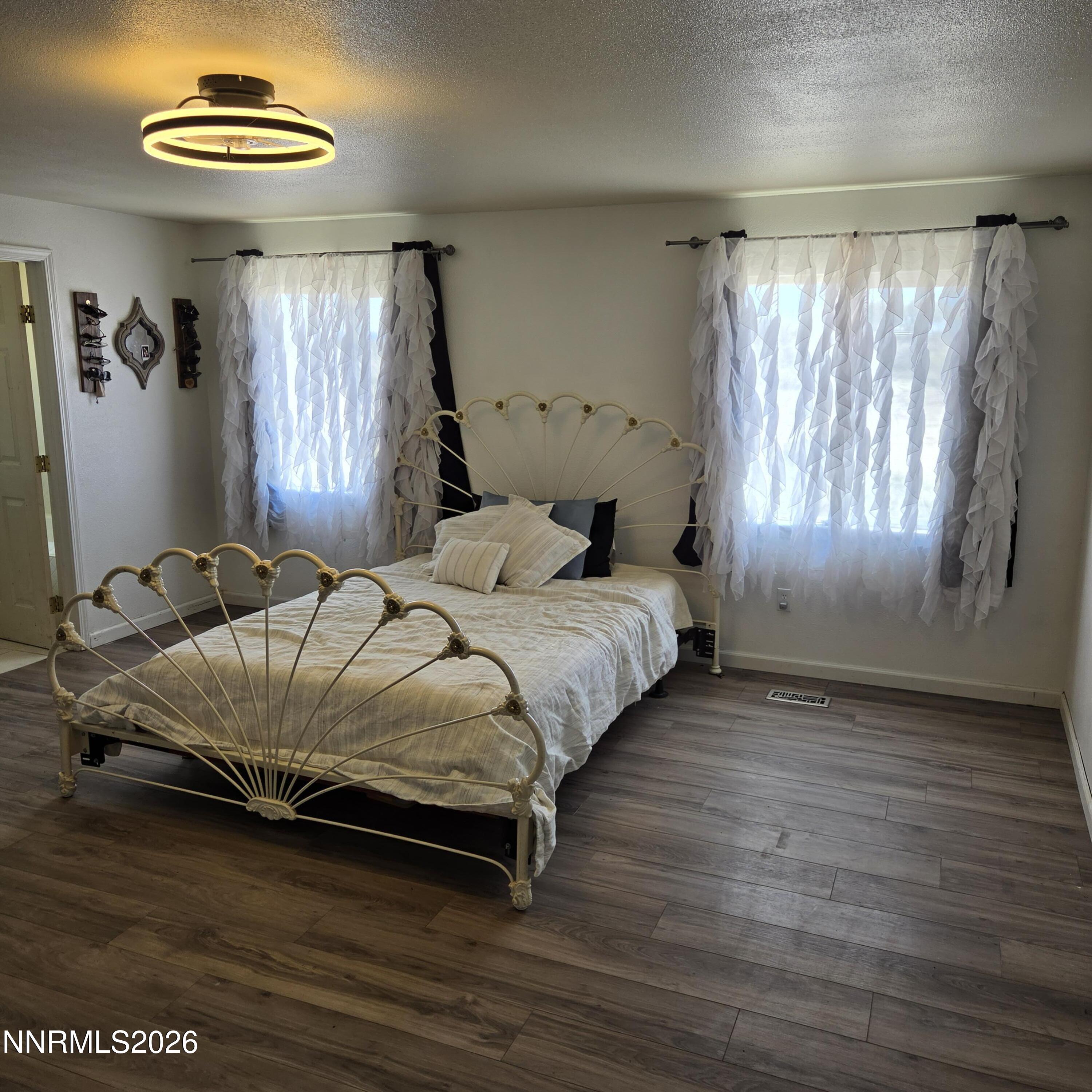 1080 Tarzyn Road Fallon, NV 89406 - Photo 32 of 41 a bedroom with a bed and a window