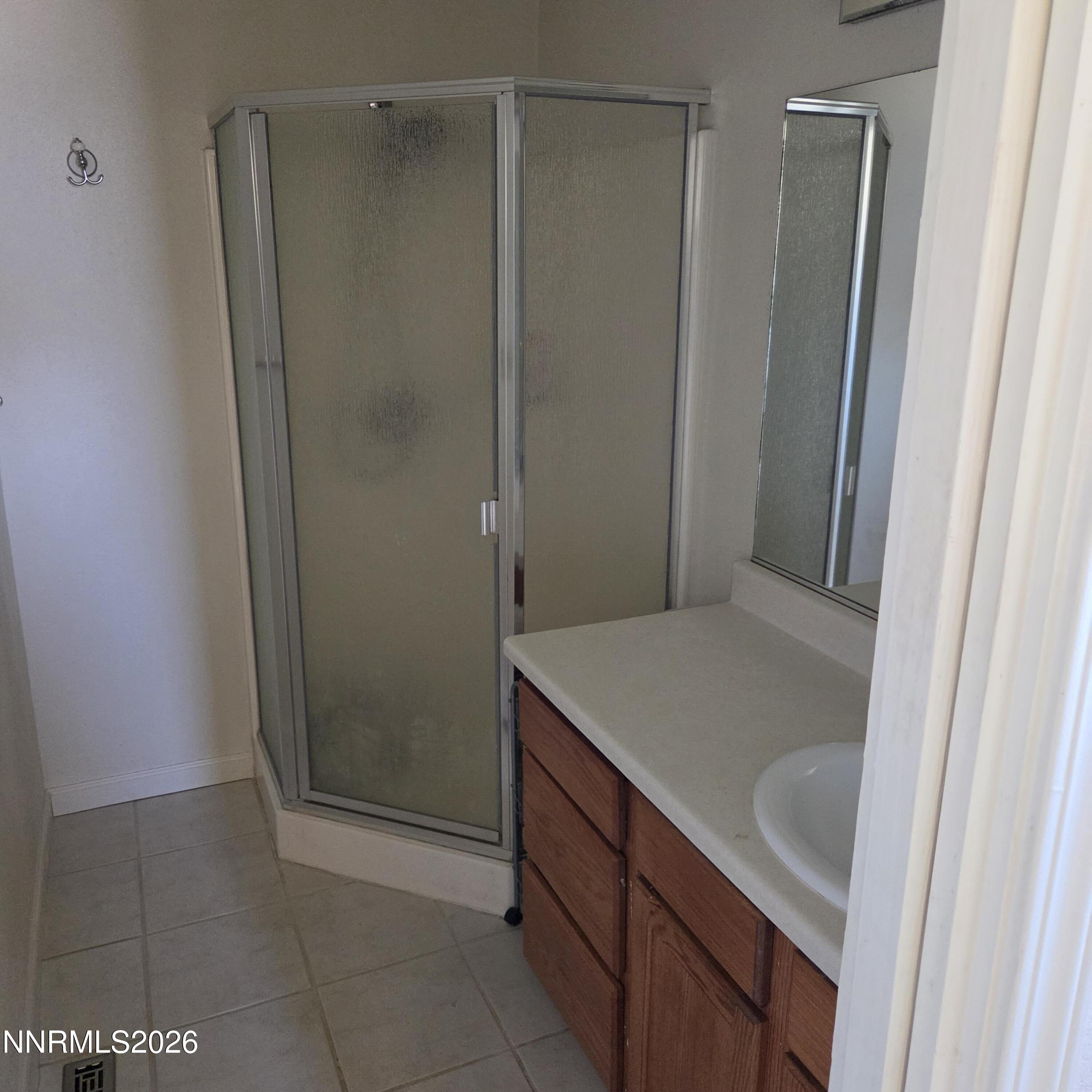 1080 Tarzyn Road Fallon, NV 89406 - Photo 34 of 41 a bathroom with a sink and shower