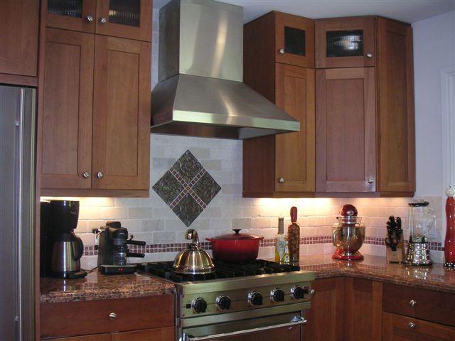 519 Fellowship Road Santa Barbara, CA 93109 - Photo 3 of 16 a kitchen with stainless steel appliances granite countertop a stove and a cabinets