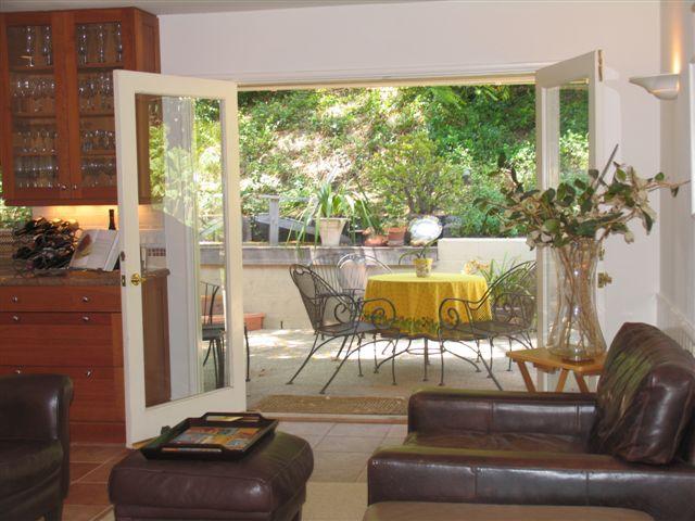 519 Fellowship Road Santa Barbara, CA 93109 - Photo 5 of 16 a living room with furniture and a floor to ceiling window