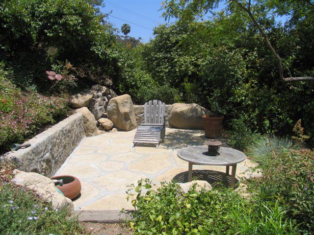 519 Fellowship Road Santa Barbara, CA 93109 - Photo 7 of 16 a backyard of a house with yard and outdoor seating