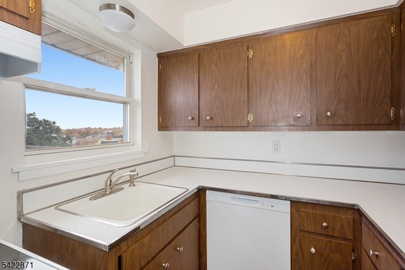 145 Arnot Street, Unit 4B Lodi, NJ 07644 - Photo 13 of 21 a bathroom with a sink and a mirror