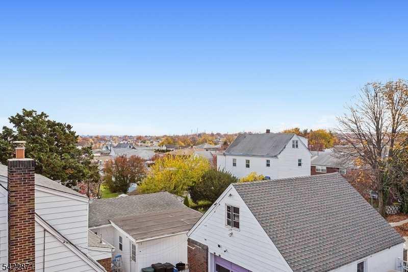 145 Arnot Street, Unit 4B Lodi, NJ 07644 - Photo 21 of 21 a view of a terrace with a garden