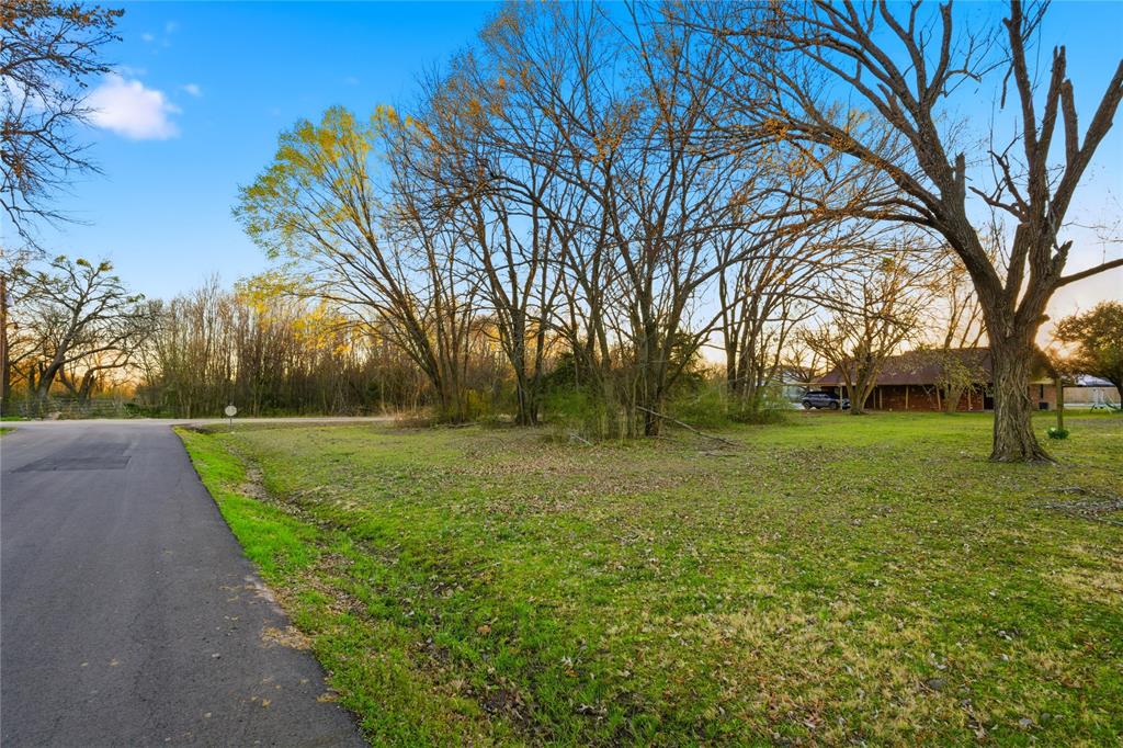 Tbd Southeast 1st Street Cooper, TX 75432 - Photo 1 of 10 a view of a park with large trees