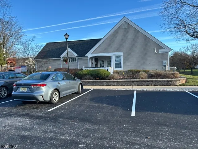 a car parked in front of a house