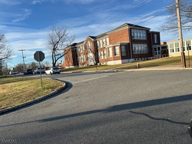 a view of a house with a swimming pool